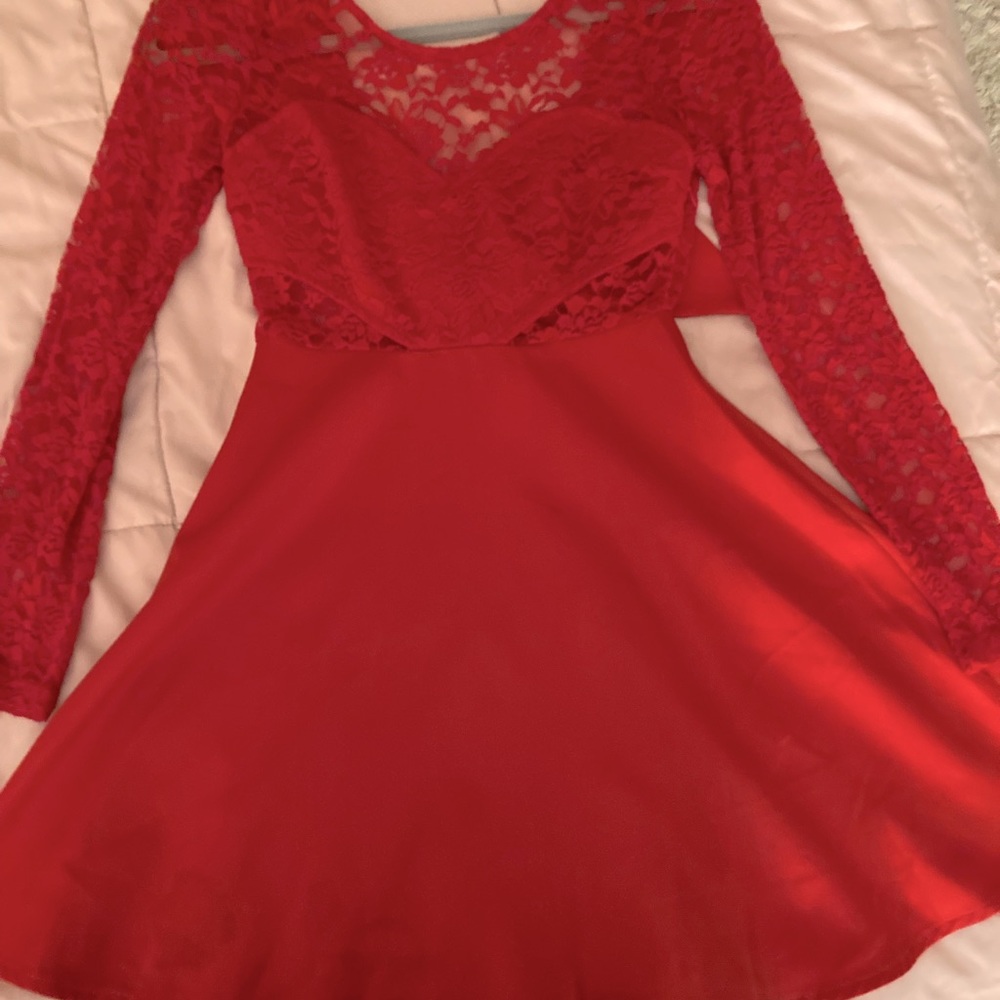 Red mini dress tied up with the perfect bow